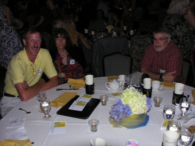 Left to right: Randy and Chris Ferrell and Jeff Long at the Saturday dinner.
